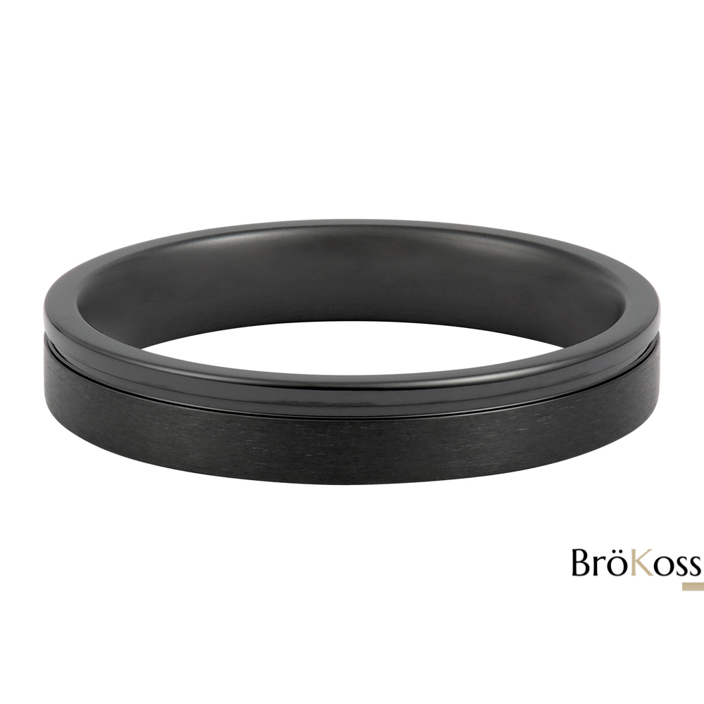 Alianza negra hombre lisa en zirconio negro, 4,5 mm de ancho, acostada sobre fondo blanco
